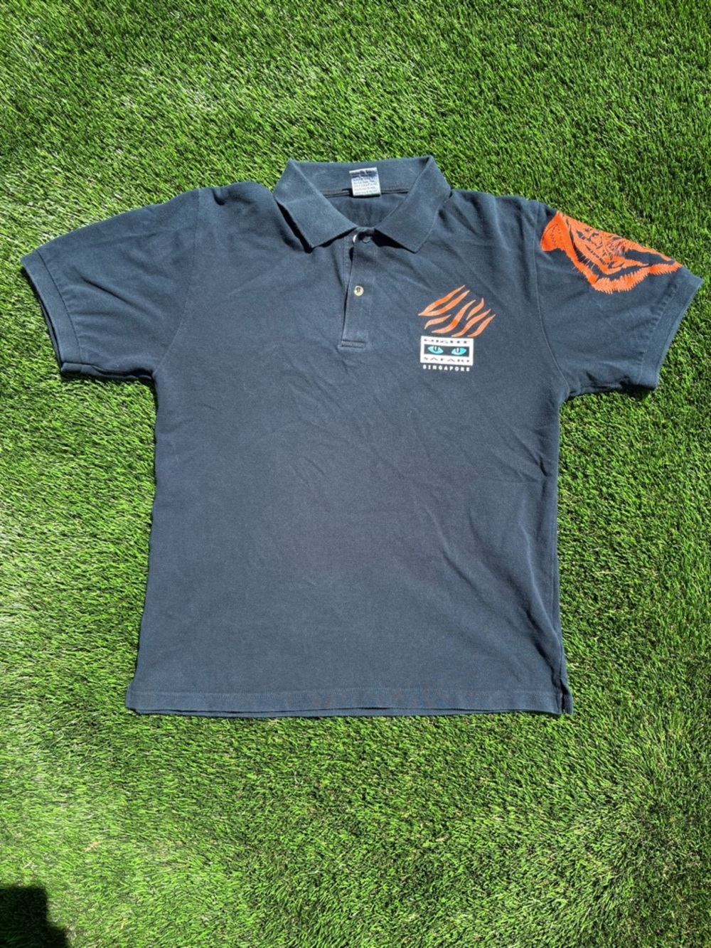 Y2K Safari Night Singapore Men’s Navy Polo with Orange Tiger Graphic